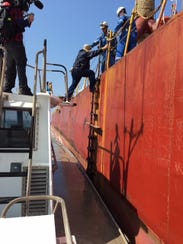 Capt. Adams is seen in a Aransas-Corpus Christi Pilots Association photo boarding a ship. The experienced pilot died on Saturday after a gangway gave way while boarding.