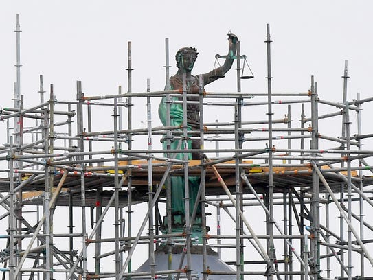 The statue of Lady of Justice on top of the Augusta