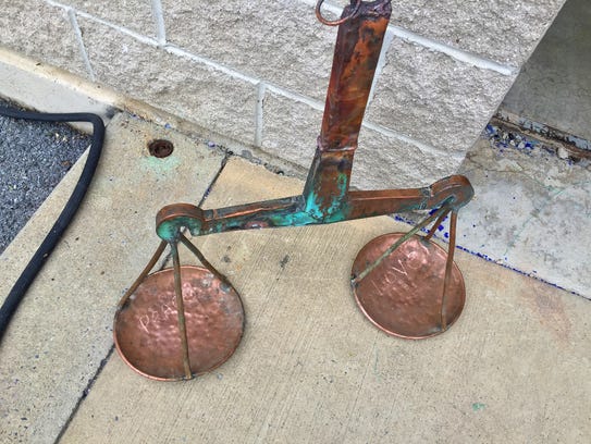 The new set of scales for the statue of Lady Justice,