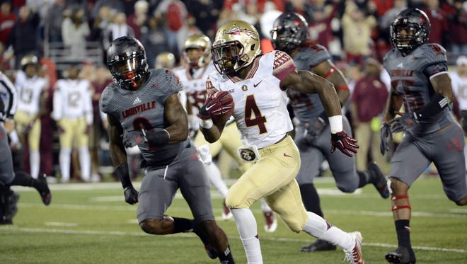 Jamie Rhodes-USA TODAY Sports
 Florida State?s Dalvin Cook has emerged as one of the top backs in the nation.
Oct 30, 2014; Louisville, KY, USA; Florida State Seminoles running back Dalvin Cook (4) runs the ball against Louisville Cardinals safety James Sample (2) during the second half at Papa John's Cardinal Stadium. Florida State defeated Louisville 42-31.  Mandatory Credit: Jamie Rhodes-USA TODAY Sports