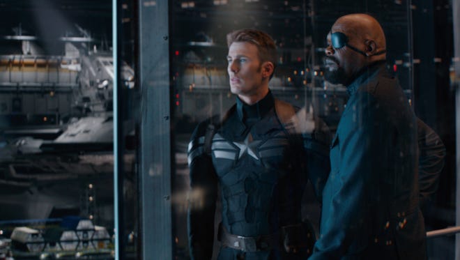 Cap (Chris Evans) and Nick Fury (Samuel L. Jackson) are at the center of a big ol' conspiracy in "Captain America: The Winter Soldier."