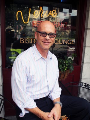 The Verve Restaurant located at 18 East Main Street in Somerville just celebrated its 20th anniversary on June 20th.. Here owner Rick St. Pierre is photographed at his restaurant.
