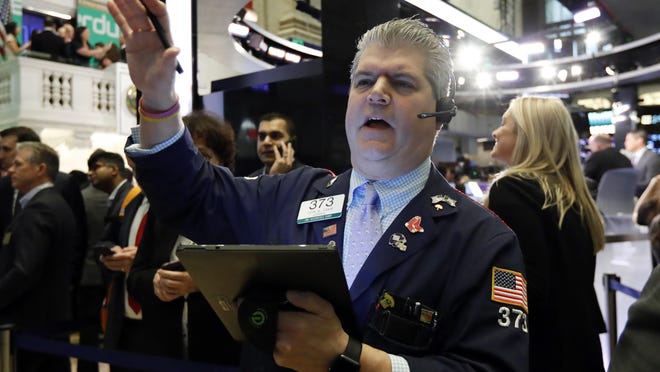 FILE - In this April 11, 2019, file photo trader John Panin works on the floor of the New York Stock Exchange. The U.S. stock market opens at 9:30 a.m. EDT on Tuesday, May 7. (AP Photo/Richard Drew, File)