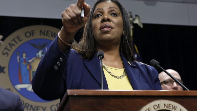 New York State Attorney General Letitia James speaks during a news conference at her office in New York in 2019.