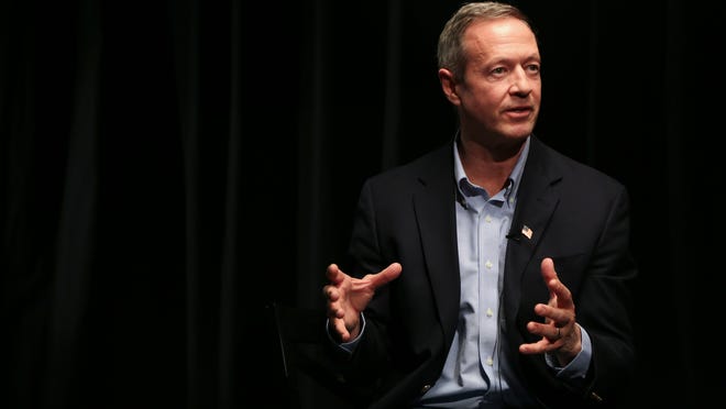 Former Maryland Gov. Martin O'Malley is pictured inside The Des Moines Register newsroom on Saturday in Des Moines.