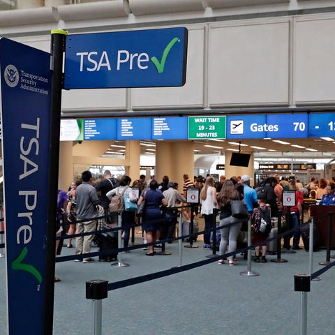 TSA precheck in Orlando, Florida, on June 21,...