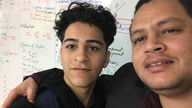 Yusef Haddabah, a student at the Rising Star Academy in Union City, with his teacher Ahmed Abdel-Basit.
