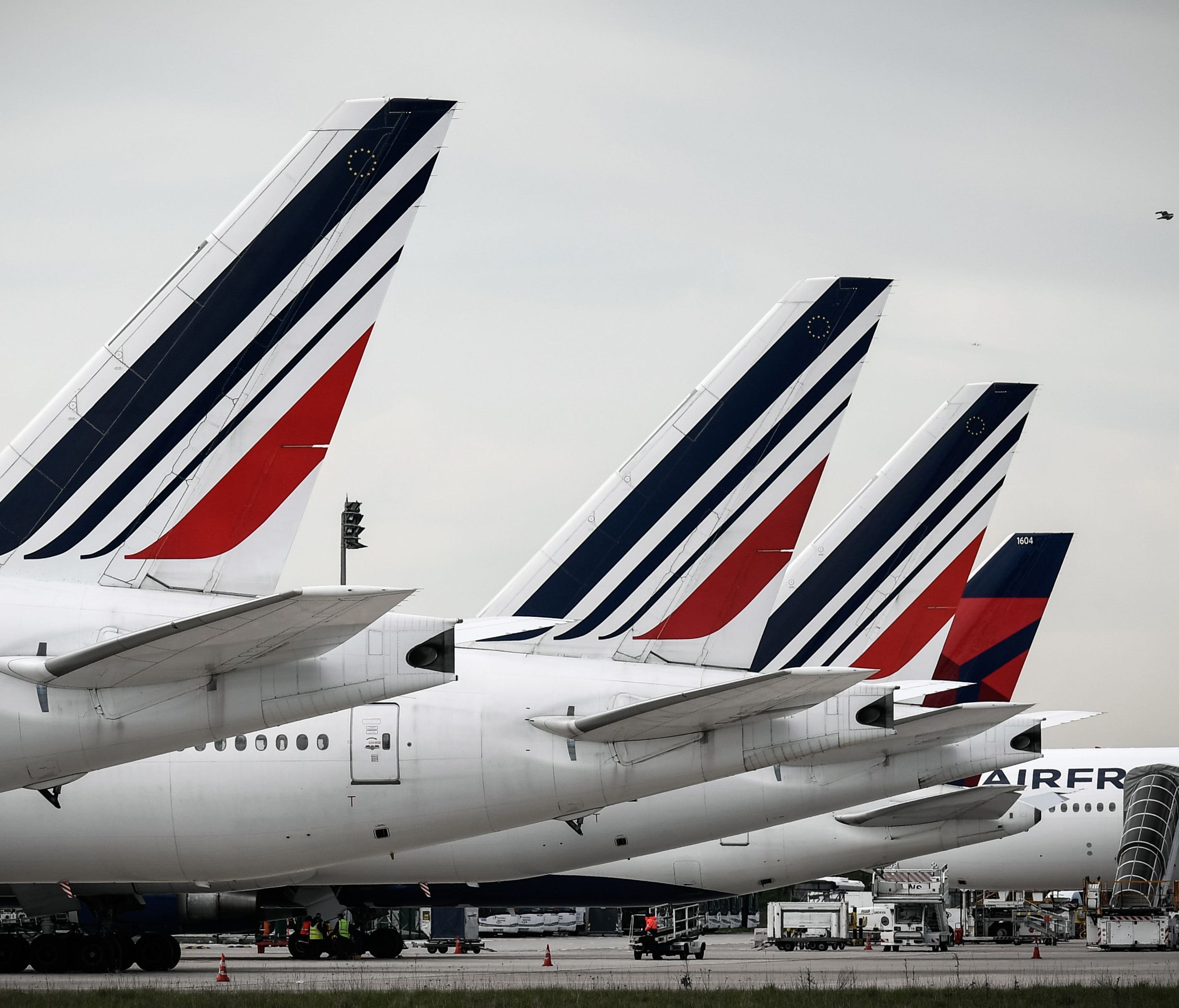 This file photo taken on April 11, 2018, shows Air France planes at Paris Charles de Gaulle Airport; one aircraft of partner Delta can be seen among them.