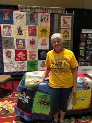 Cheryl Murdock operates Run With It Quilts out of her home in Pensacola North Hill, where she turns people's old T-shirts into memorable quilts.