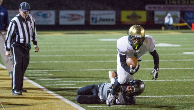 Desert Hills and Snow Canyon compete for the chance to advance in the 3AA Playoffs Friday, Nov. 6, 2015.