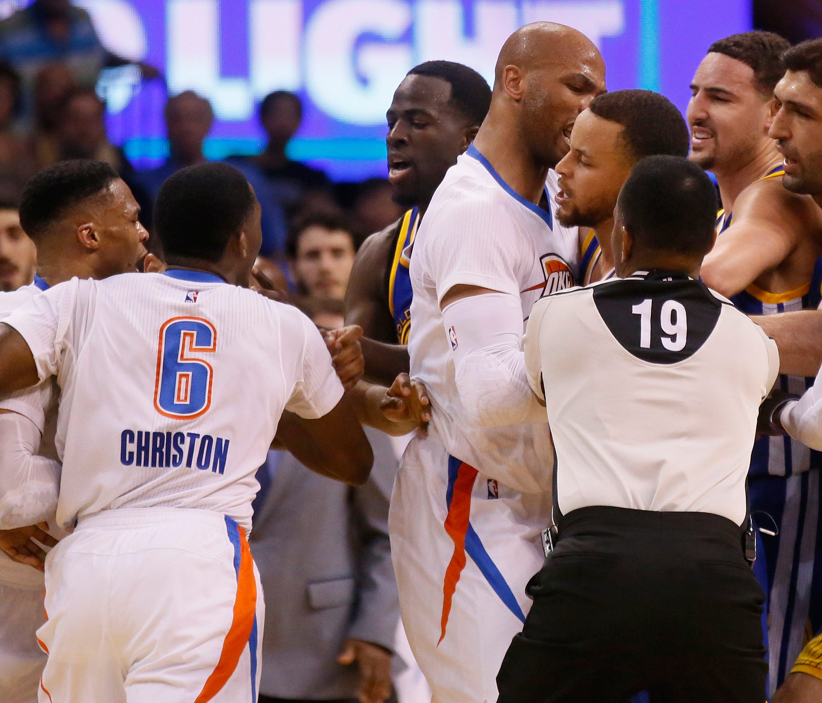 From left, Oklahoma City Thunder guard Russell Westbrook and guard Semaj Christon (6), Golden State Warriors forward Draymond Green, Thunder forward Taj Gibson, and Warriors guards Stephen Curry and Klay Thompson get into a tussle during the second q