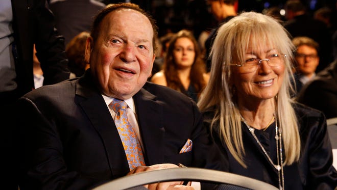 Sheldon Adelson and his wife Miriam await the first presidential debate between Democratic presidential nominee Hillary Clinton and Republican presidential nominee Donald Trump at Hofstra University in Hempstead, N.Y.