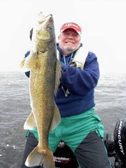 Mike Mulqueen of Milwaukee with a big fall walleye