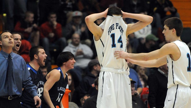 Pine Plains' Tyler Lydon, left, and Justin Cooper, react in the final minute of the game on March 16, 2013 as they trail Lake George in Glens Falls.