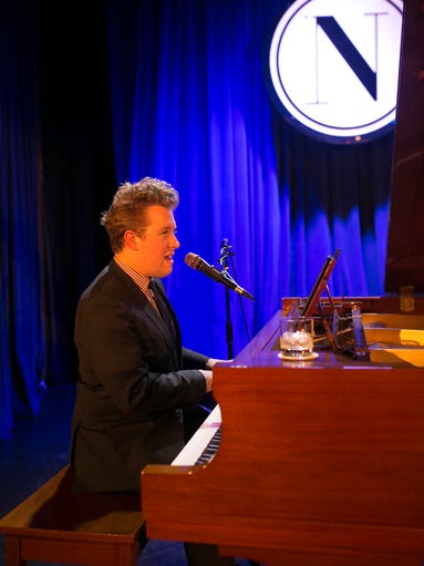 Max Wellman performs during Des Moines Fashion Week's