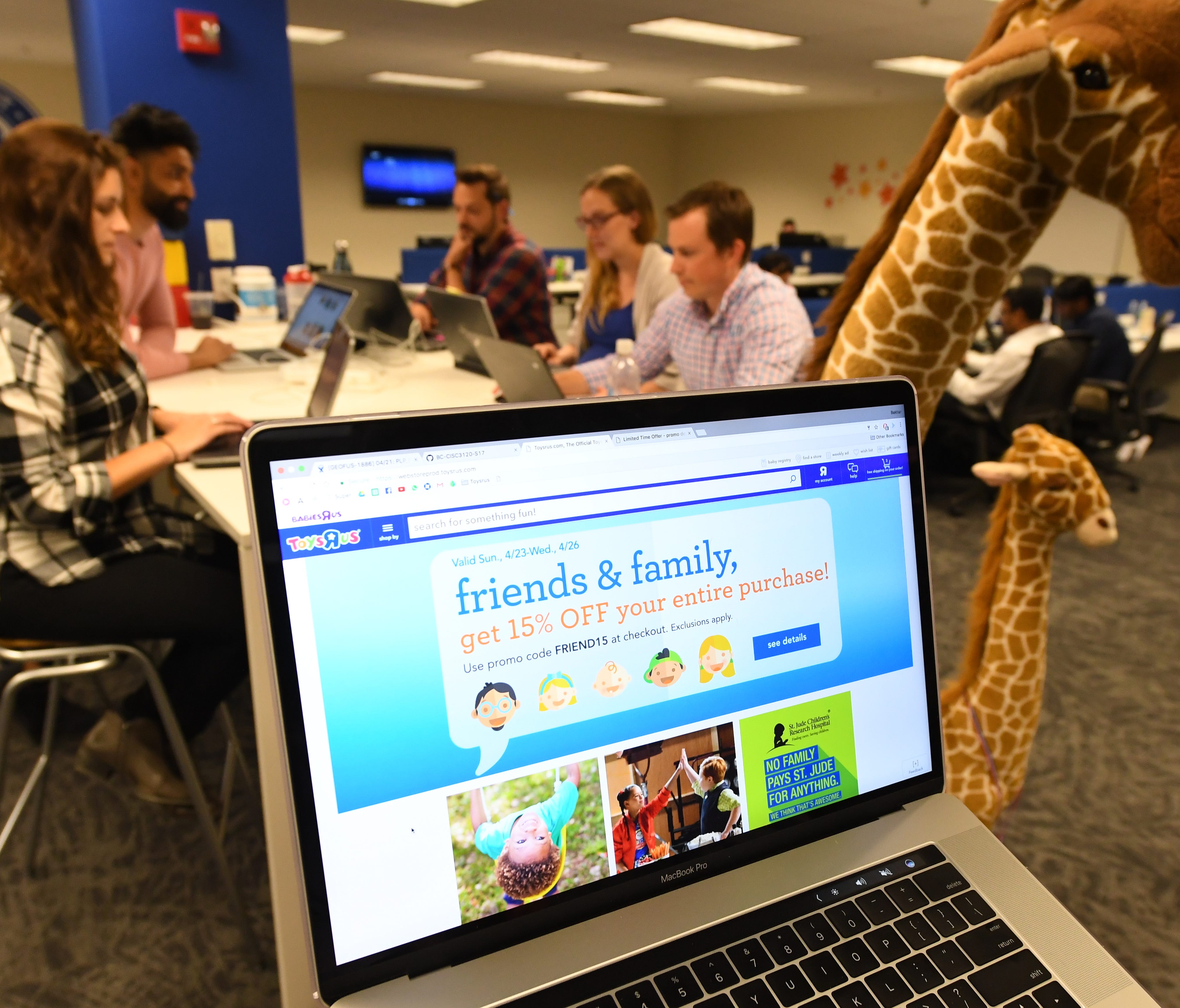 The Toys R Us Web team in Wayne, N.J., works April 25, 2017, on a revamped website making its debut May 8, 2017. The makeover will feature bolder images, streamlined menus, and a pared down check out process.