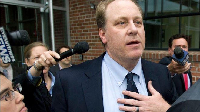 Former Boston Red Sox pitcher Curt Schilling, head of 38 Studios, departs the Rhode Island Economic Development Corporation headquarters in Providence in 2012.
