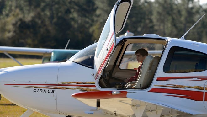 Maddux Nagel,11, waits to take off on his flight during the Young Eagles Rally Saturday at Ferguson Field. Young Eagles is a program created by the US Experimental Aircraft Association designed to give children between the ages of 8 to 17 an opportunity to experience flight in a general aviation airplane while educating children about aviation. This program is offered free of charge with donations and volunteers. The program was launched in 1992.