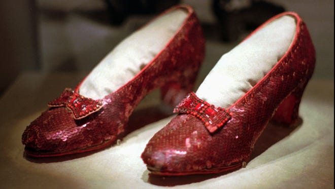 This April 10, 1996 file photo shows one of the four pairs of ruby slippers worn by Judy Garland in the 1939 film "The Wizard of Oz" on display during a media tour of the "America's Smithsonian" traveling exhibition in Kansas City, Mo.