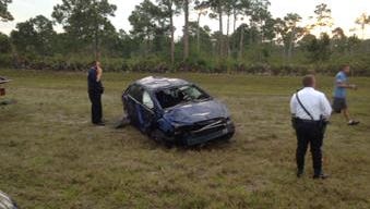 Law enforcement officials on the scene of a fatal rollover on Burnt Store Road in Cape Coral Monday, April 20.