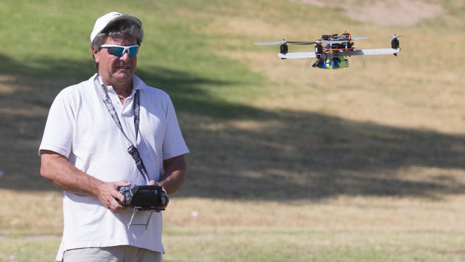 The debate over the use of drones is growing in the Valley and across the nation as more hobbyists use them for fun and more companies use them to carry out business. Mike Parker (above), owner of Arizona Technology Group Inc., flies his drone at Thude Park in Chandler.