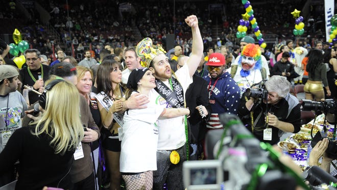 Patrick Bertoletti wins Wingbowl 23 after defeating Molly Schuyler (left) 444-440. Friday, January 30, 2015.