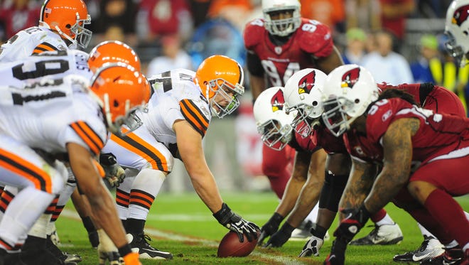 Cleveland Browns center (55) Alex Mack prepares to snap the ball against the Arizona Cardinals at University of Phoenix Stadium. The Cardinals defeated the Browns 20-17 in overtime.