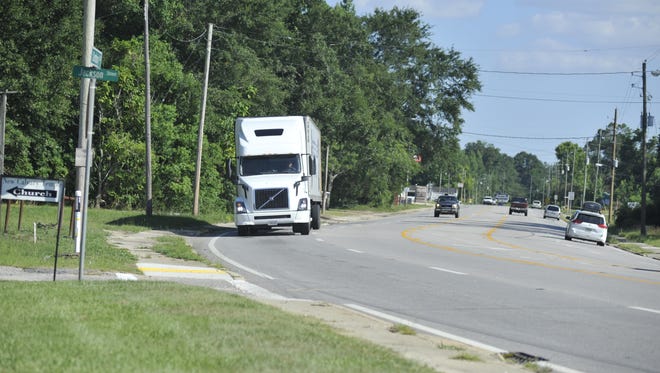 A curve on North Century Boulevard  tipped two semi trucks onto the sidewalk in one week. Now the Florida Department of Transportation is looking to see what can be done to improve the road.