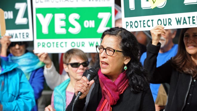 Dr. Laura Solorio talks about public health at a Yes on Z rally outside the Monterey County administrative offices in Salinas on Tuesday.