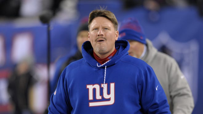 The Giants are reportedly facing a fine for coach Ben McAdoo’s alleged use of a walkie-talkie to communicate with Eli Manning from the sideline during the team's 10-7 victory over the Cowboys on Dec. 11.