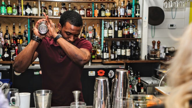 Sean Norris uses the shaker with flair at the Fork & Flask at Nage. He doesn’t want to be the center of attention, but also wants to show that he’s really comfortable behind the bar.