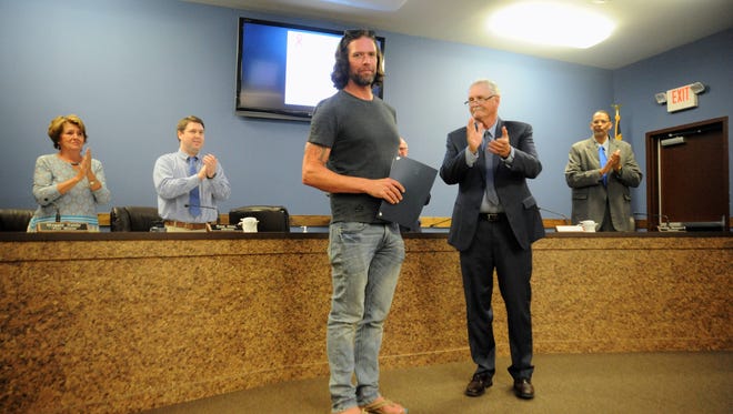Black Mountain's Kenny Capps was presented with a proclamation from mayor Don Collins on June 11 declaring the day "Kenny Capps Day" in town. The proclamation was in honor of Capps' 1,175-mile run across the state to raise awareness and money for Multiple Myeloma, which he was diagnosed with in 2015.