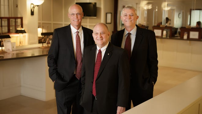 From left to right: FMB Board Chairman F. Wilson Carraway, immediate past President and CEO Michael Sims and President and CEO Ian Donkin.