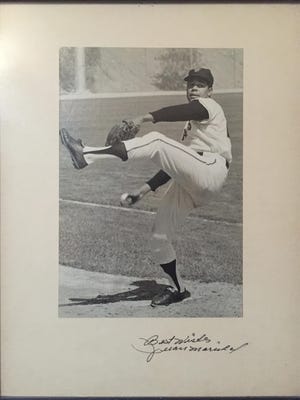 A signed, framed photo of Juan Marichal taken by Tom Boulton of Melbourne in 1967. The photo currently hangs in his son’s house in Fort Lauderdale.