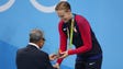 Dana Vollmer (USA) receives her bronze medal on the