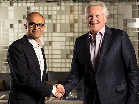 Microsoft CEO Satya Nadella, at left, with Jeff Immelt,