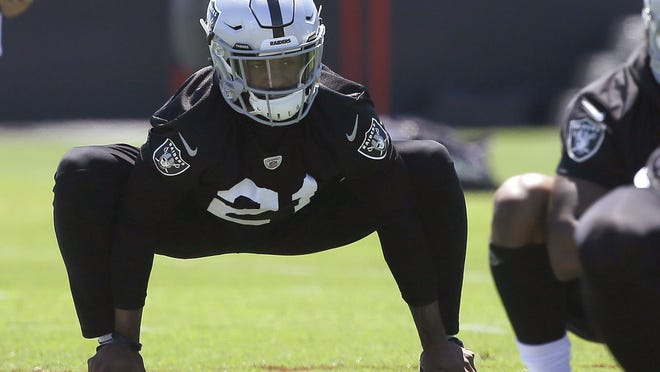 Oakland Raiders cornerback Gareon Conley stretches during practice at the NFL football team's minicamp Tuesday, June 12, 2018, in Alameda, Calif. (AP Photo/Rich Pedroncelli)