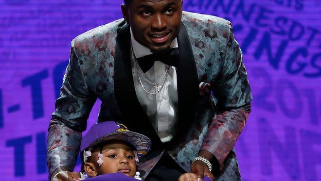 Former Ole Miss wide receiver Laquon Treadwell poses with daughter Madison after being selected by the Minnesota Vikings as the number twenty-three overall pick in the first round of the 2016 NFL Draft at Auditorium Theatre. Mandatory Credit: Kamil Krzaczynski-USA TODAY Sports