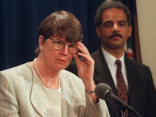 Attorney General Janet Reno, accompanied by Deputy