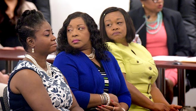 From left, Sandra Thompson, Carolyn Dow and Sandra Harrison listen as Myneca Ojo, right, give testimony during the second Pennsylvania Human Relations Commission hearing at York City Council Chambers Friday, June 22, 2018. The hearing was in response to allegations that the four and another member of the Sisters in the Fairway were racially harassed during an incident at Grandview Golf Club in April. Bill Kalina photo