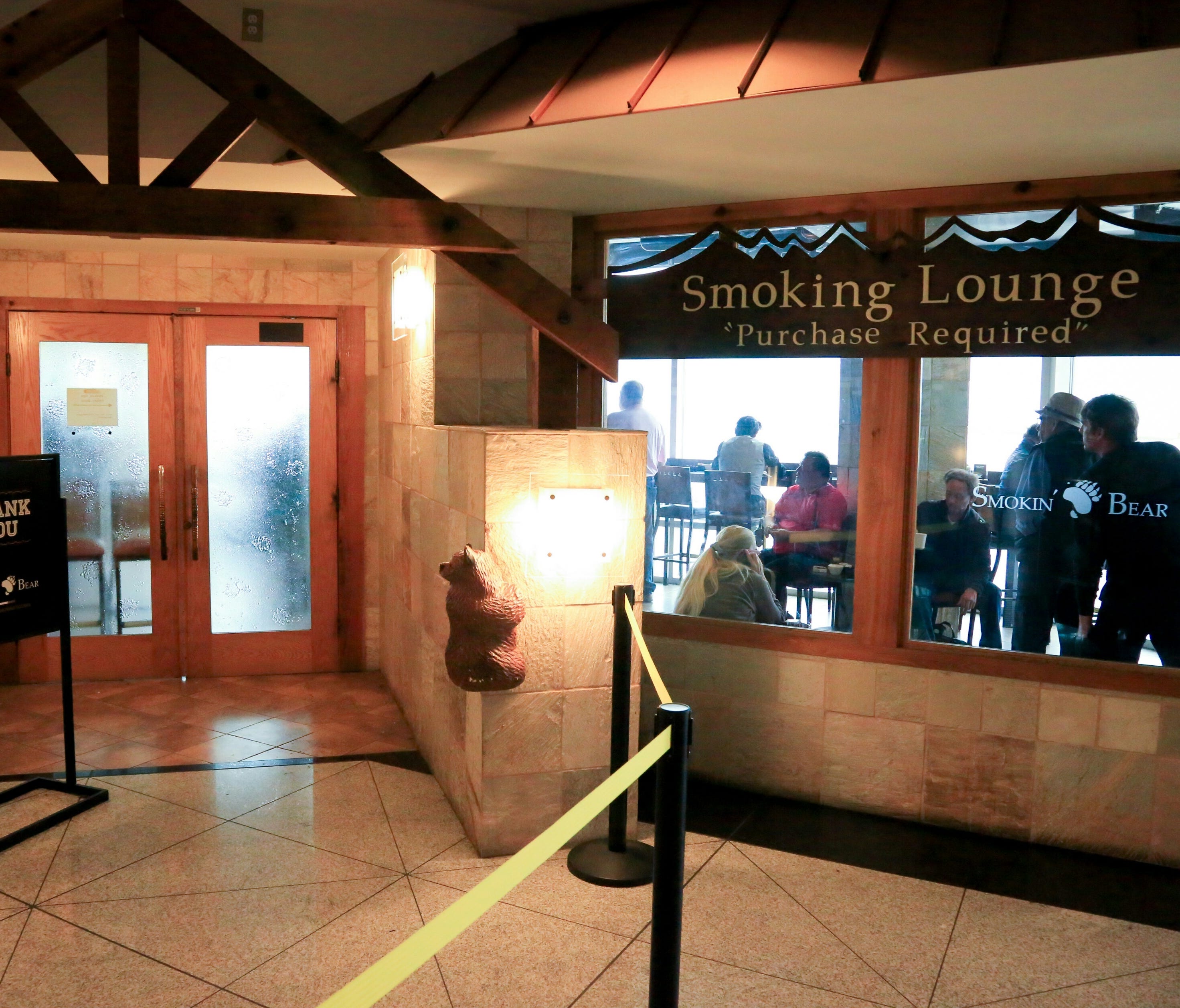 This file photo from September 2015 shows The Smokin' Bear Lodge Smoking Lounge at Denver International Airport, one of the smoking lounges that was then open at the airport.