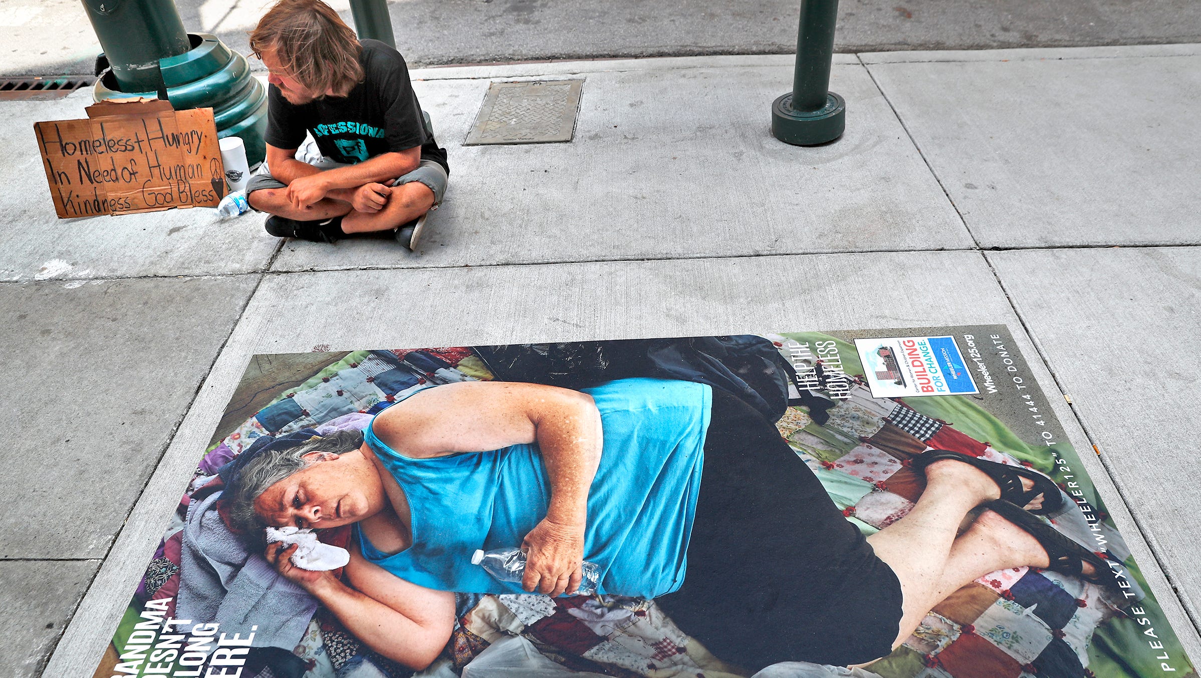Sidewalk Art Features Women Kids Sleeping On The Street