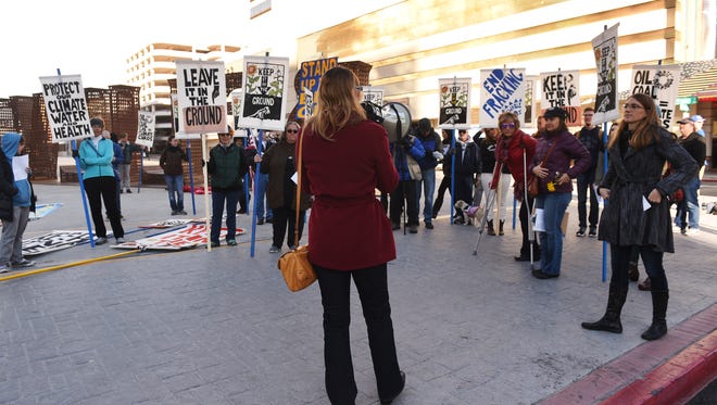 Climate change activist stage a "keep it in the ground" rally in downtown Reno on March 8, 2016. The activists gathered to protest the BLM's fossil fuel lease sale that would allow industry to bid on more than 50,000 acres of publicly owned oil and gas leases in Nevada. 