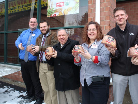 From left: Jeremy Latimer, District Manager; Jack Seman;