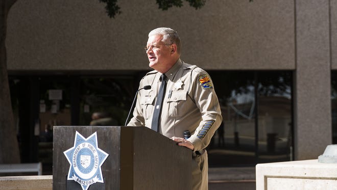 Arizona Department of Public Safety Director Frank Milstead talks about the motorist who killed a man attacking a DPS trooper on Interstate 10, and the suspect and victim, during a press conference in Phoenix on Jan. 16, 2017.