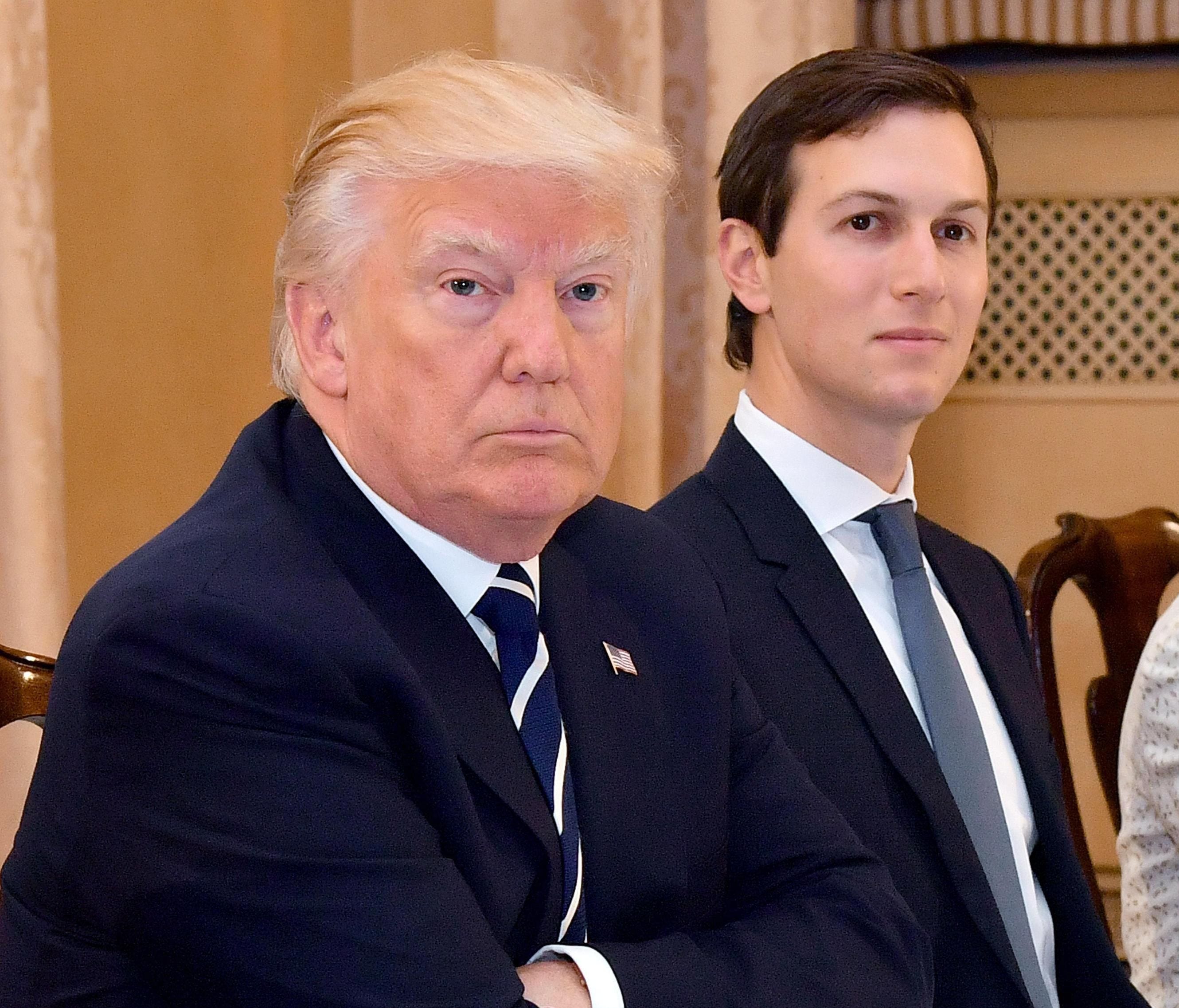 President Trump is flanked by senior adviser and son-in-law Jared Kushner during a meeting with Italian Prime Minister Paolo Gentiloni at Villa Taverna in Rome May 24.