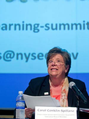Carol Conklin-Spillane of the Empire State School Administrators Association speaks during a learning summit on teacher and principal evaluation at the New York State Museum in Albany, N.Y.