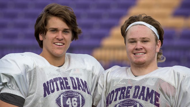 Couusins Landon (headband, right) and Slater Zellers, August 1, 2017, during Notre Dame Prep football practice.