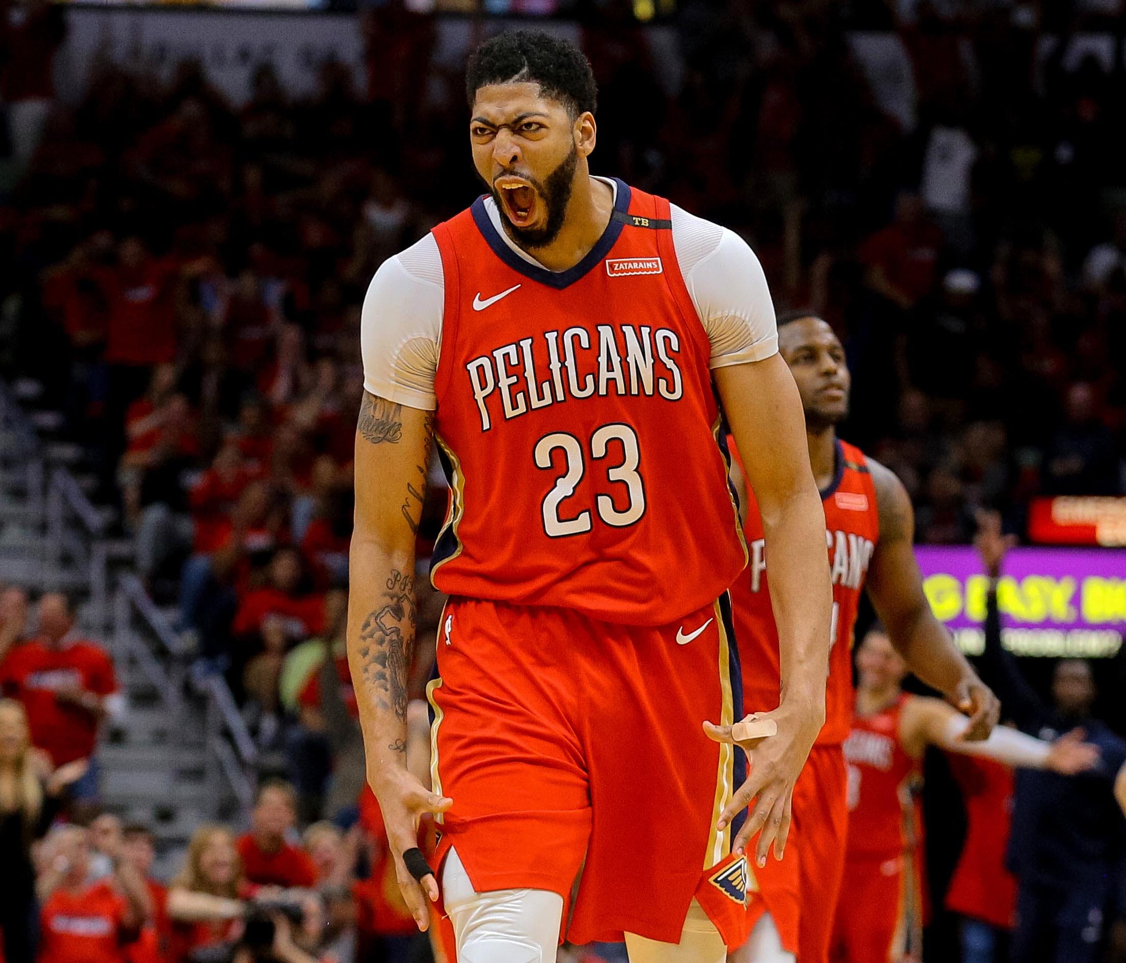New Orleans Pelicans forward Anthony Davis (23) celebrates during the second half in game three of the first round of the 2018 NBA Playoffs against the Portland Trail Blazers at the Smoothie King Center.