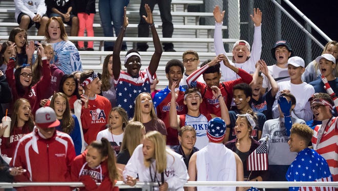 The New Oxford student section gets pumped up during play against Bermudian Springs on Friday, September, 1, 2017.